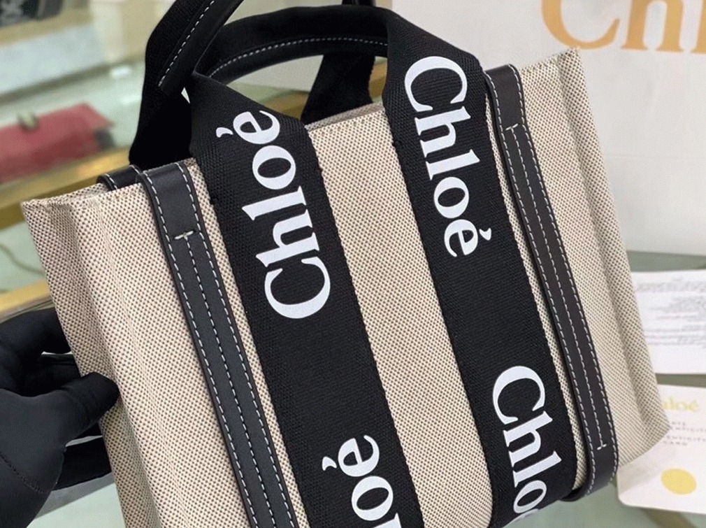 top quality replica Ch10e small woody tote bag in canvas with black leather strips