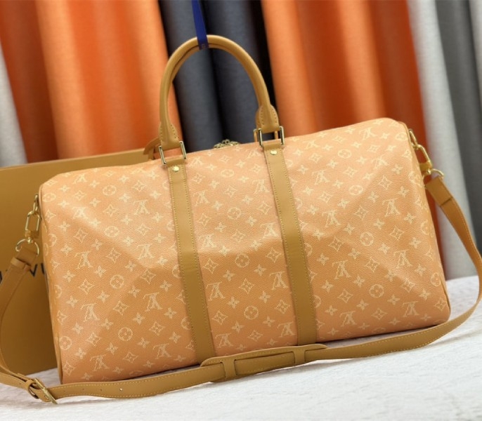 L0vis Vvtt0n Monogram Heritage Canvas Keepall Bandouliere 50 In Yellow