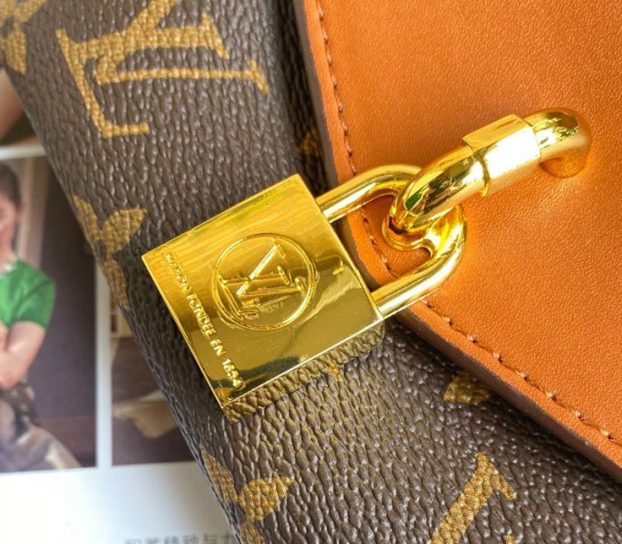 L0vis Vvtt0n Monogram Canvas Padlock On Strap Bag In Caramel