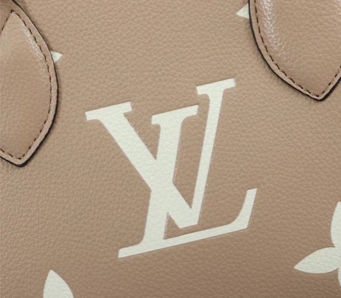 L0vis Vvtt0n Bicolor Monogram Empreinte Leather Onthego PM Bag In Tourterelle Gray And Cream
