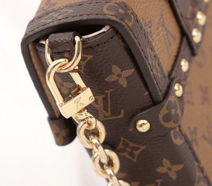 L0vis Vvtt0n Monogram Reverse Canvas Vertical Trunk Pochette