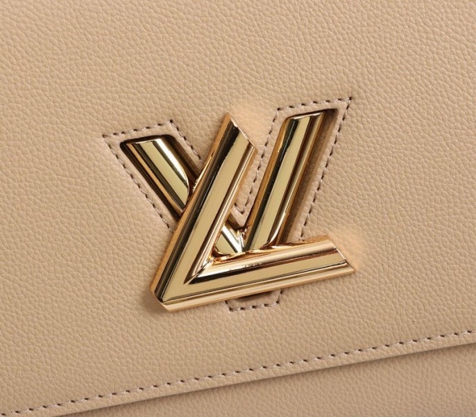 L0vis Vvtt0n Twist One Handle MM Handbag In Beige