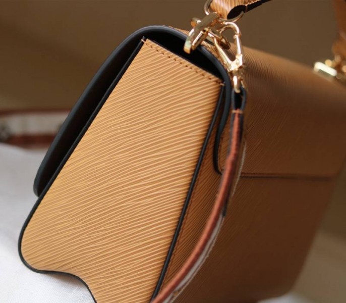 L0vis Vvtt0n Epi Leather Twist MM Bag With Jacquard Strap In Honey Gold