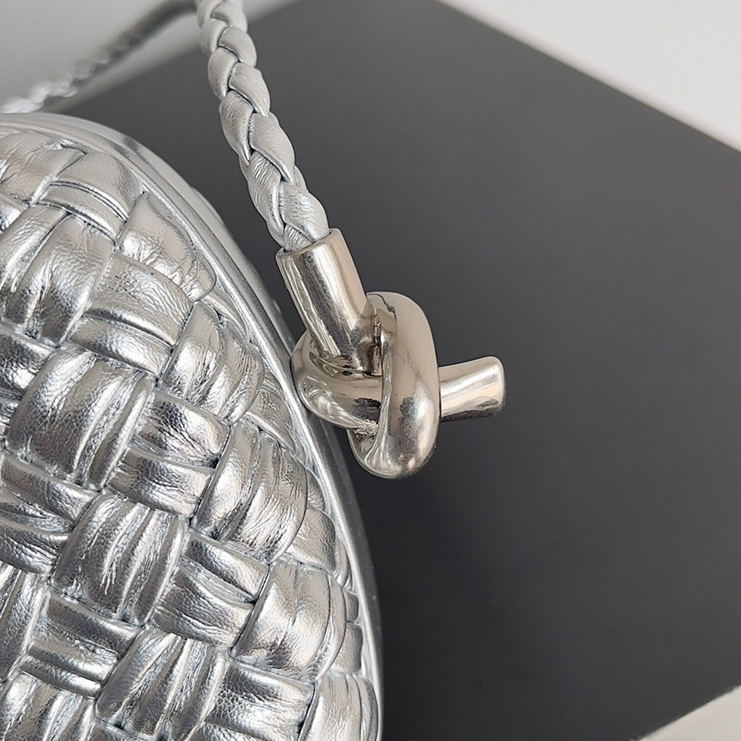 Fake B0tt*ga Ven*ta Knot Minaudiere On Strap Silver Intreccio Laminated Leather