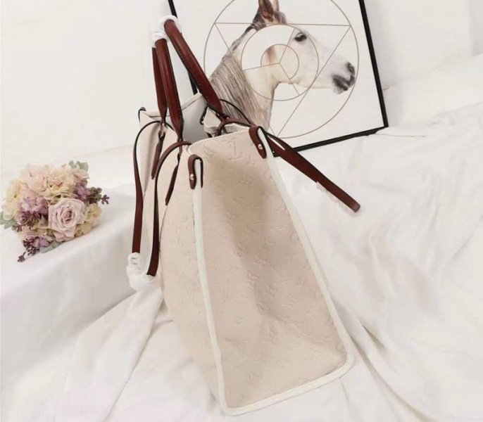 L0vis Vvtt0n Monogram Empreinte Onthego GM Tote In Cream