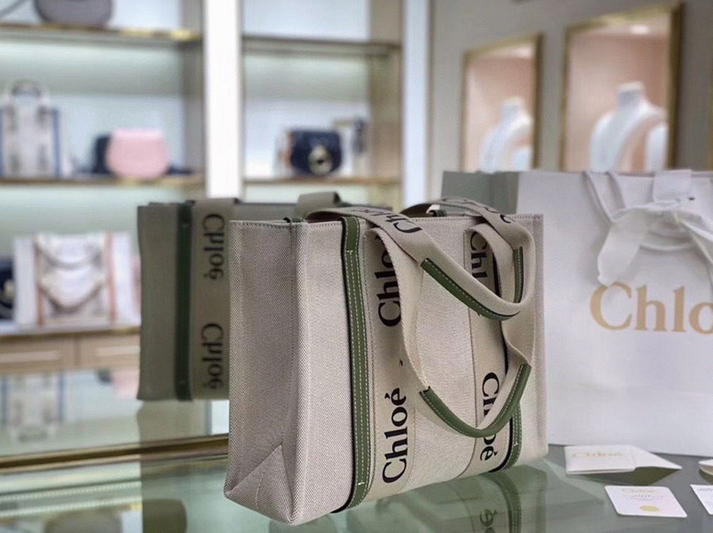 top quality fake Ch10e medium woody tote bag in canvas with green leather strips