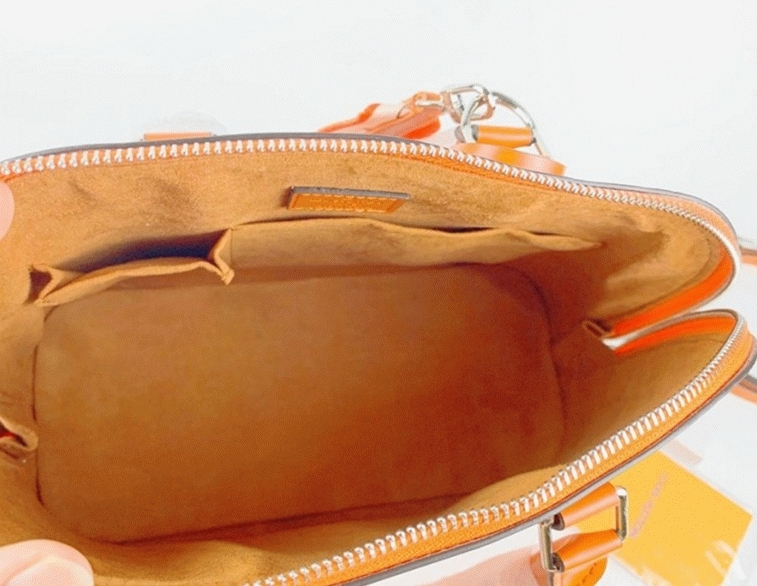 L0vis Vvtt0n Epi Leather Alma PM Handbag In Orange With Jacquard Strap