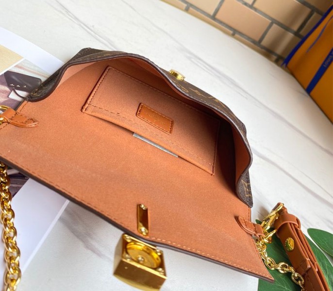 L0vis Vvtt0n Monogram Canvas Padlock On Strap Bag In Caramel