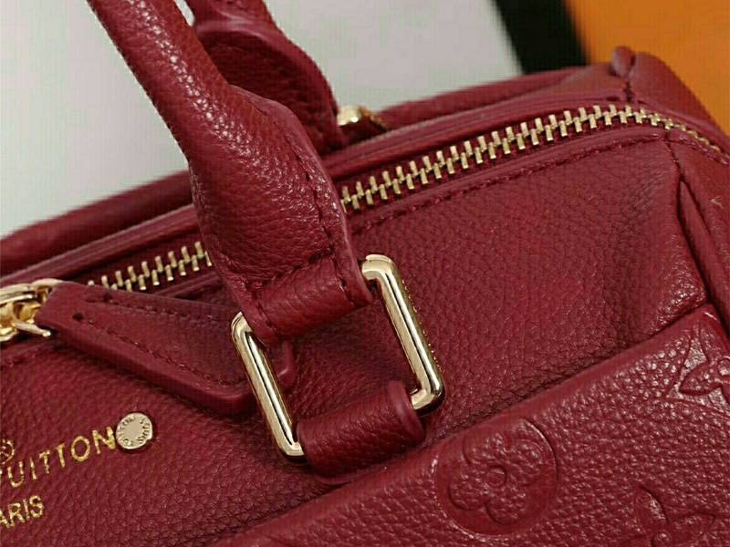 L0vis Vvtt0n Monogram Empreinte Speedy Bandouliere 25 Handbag In Bordeaux