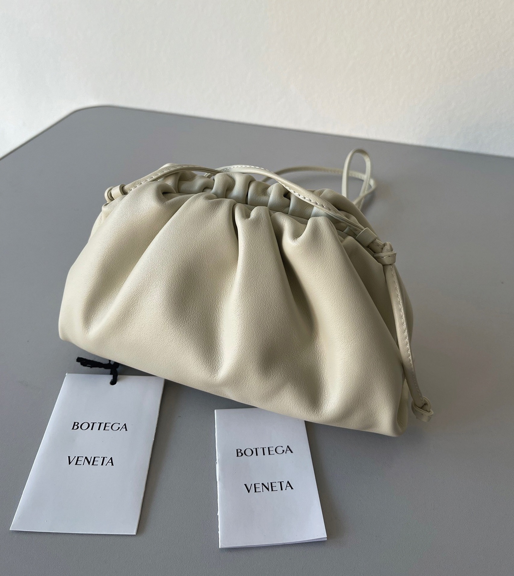 Knockoff B0tt*ga Ven*ta Mini Pouch with Strap Ivory