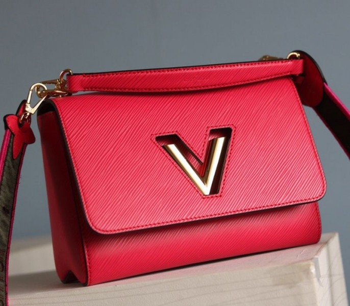 L0vis Vvtt0n Epi Leather Twist MM Handbag In Red With Embroidered Strap