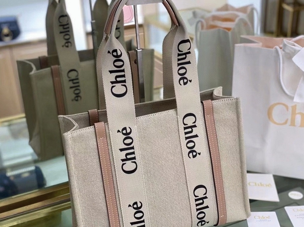 top quality replica Ch10e medium woody tote bag in canvas with beige leather strips