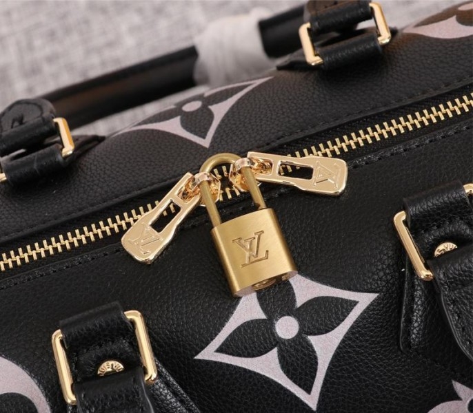 L0vis Vvtt0n Bicolor Monogram Empreinte Leather Speedy Bandouliere 25 Handbag In Black And Lilac