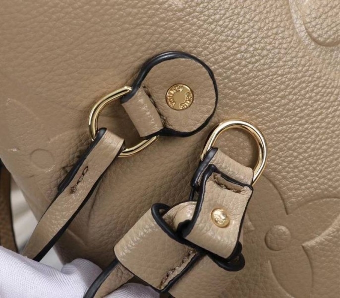 L0vis Vvtt0n Monogram Empreinte Neverfull MM Tote In Beige