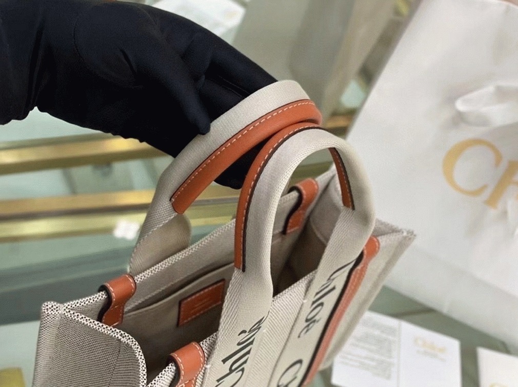 top quality knockoff Ch10e small woody tote bag in canvas with brown leather strips