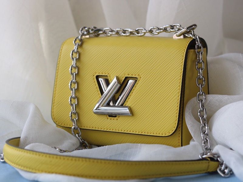 L0vis Vvtt0n Epi Leather Twist Mini Bag In Yellow