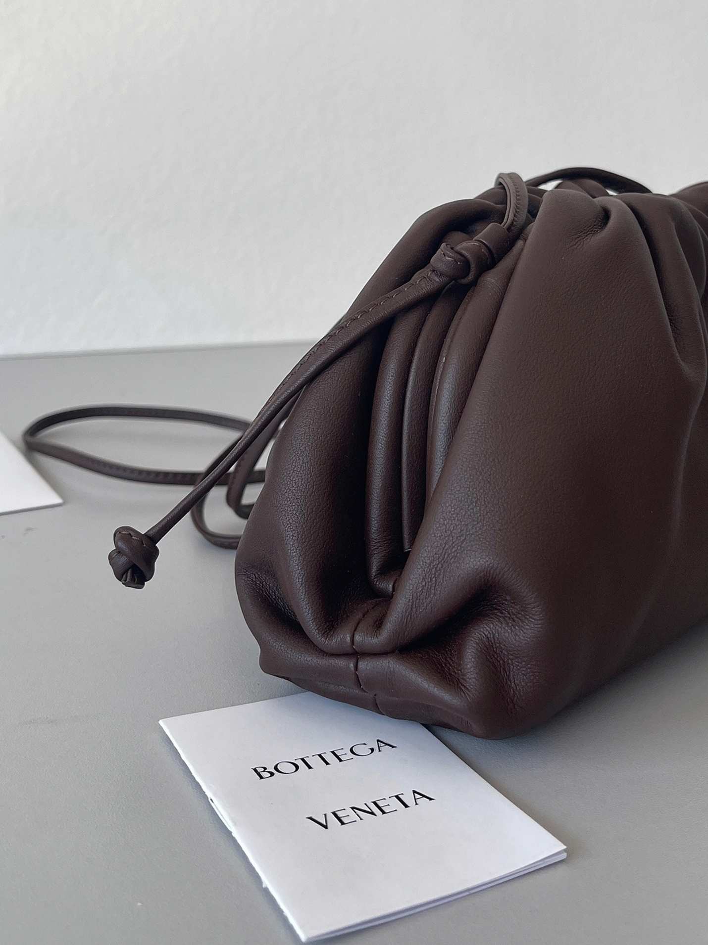 Knockoff B0tt*ga Ven*ta Mini Pouch with Strap Fondant