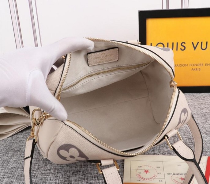 L0vis Vvtt0n Bicolor Monogram Empreinte Leather Speedy Bandouliere 25 Handbag In Cream And Bois De Rose Pink