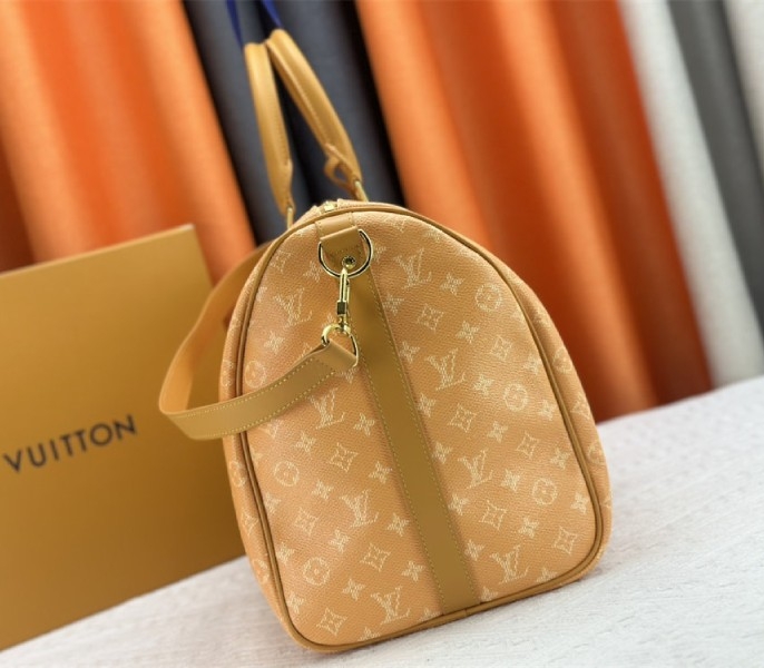 L0vis Vvtt0n Monogram Heritage Canvas Keepall Bandouliere 50 In Yellow