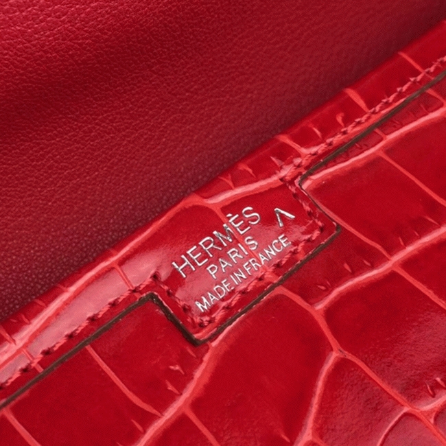 Red fake H**me5 Jige Elan 29 clutch bag