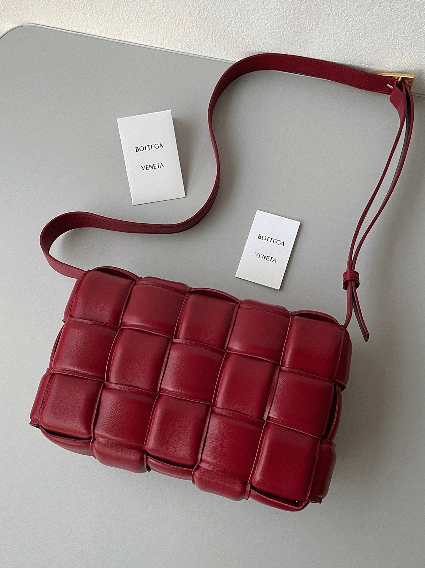 Top Quality Faux B0tt*ga Ven*ta Padded Cassette Bag In Dark Red