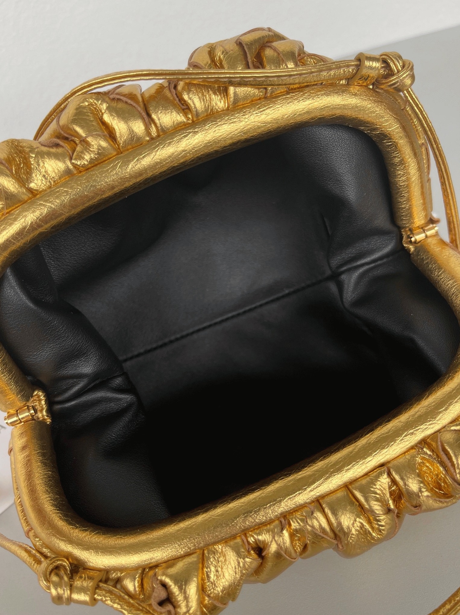 Knockoff B0tt*ga Ven*ta Mini Pouch with Strap Gold