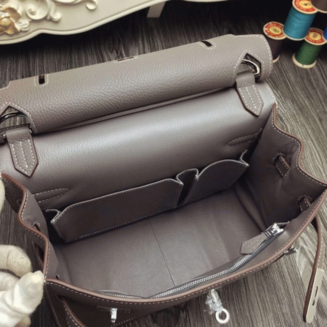Large grey knockoff H**me5 Jypsiere 31cm handbag