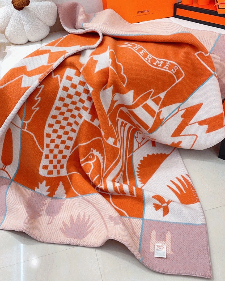 Faux H**me5 Avalon Epopee blanket in mandarine wool and cashmere