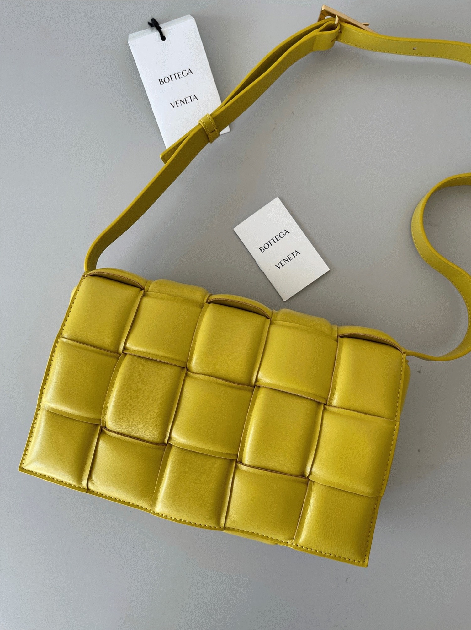 Top Quality Fake B0tt*ga Ven*ta Padded Cassette Bag In Yellow