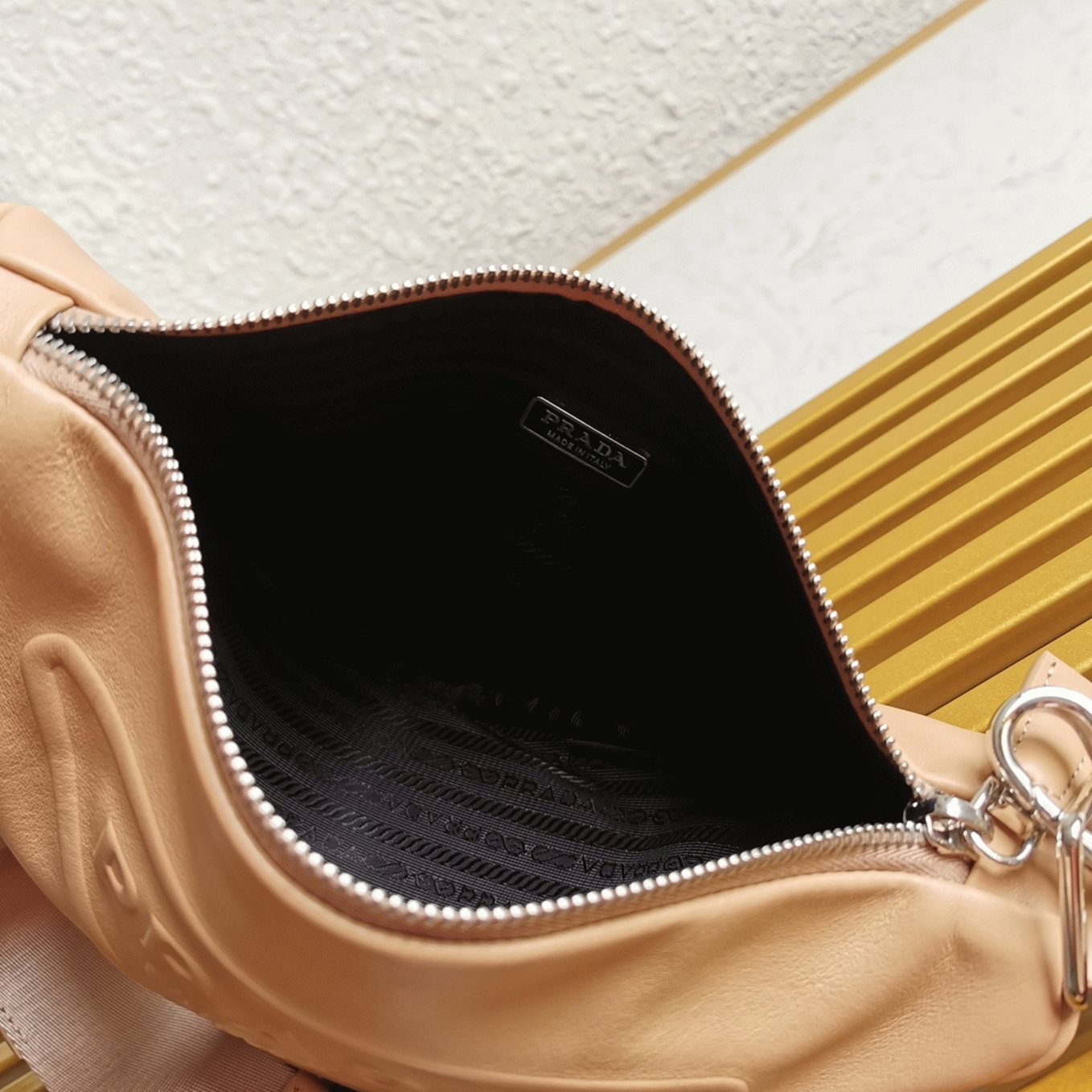 Pra*a Triangle Shoulder Bag Imitation in Beige