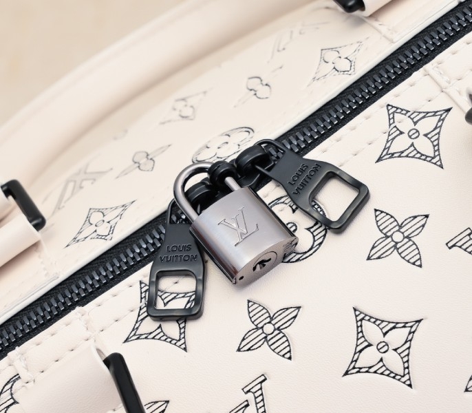 LV Monogram Shadow Keepall Bandouliere 50 In White
