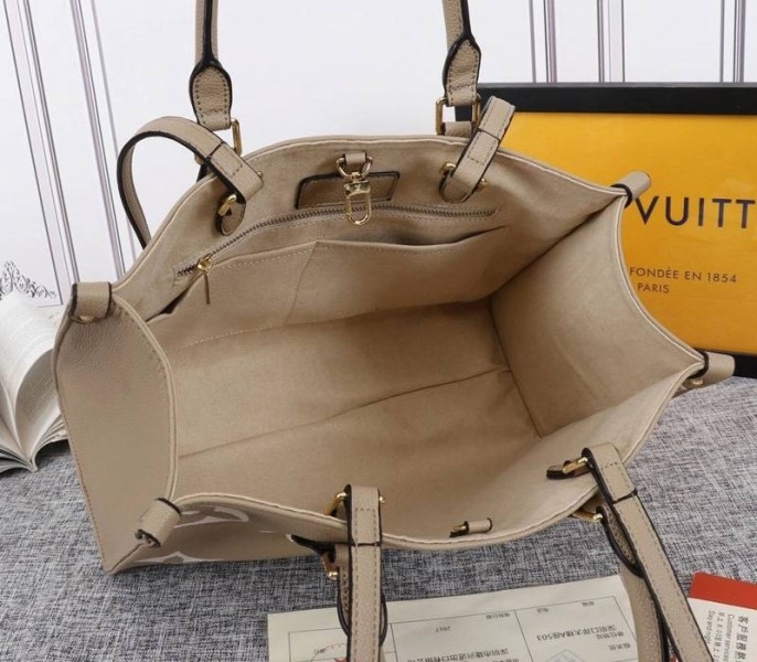 L0vis Vvtt0n Monogram Empreinte OnTheGo MM Tote In Tourterelle Gray