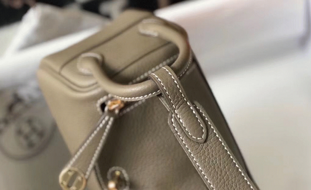 Replica H**me5 Lindy Mini handbag in taupe color