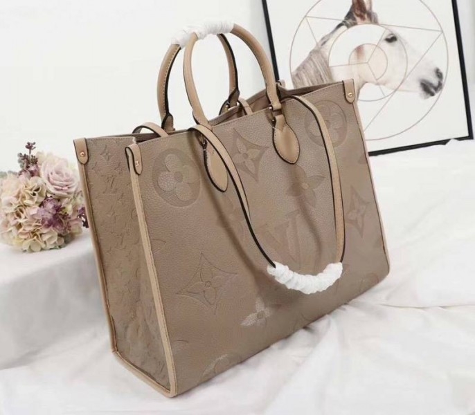 L0vis Vvtt0n Monogram Empreinte Giant Onthego GM Tote In Beige