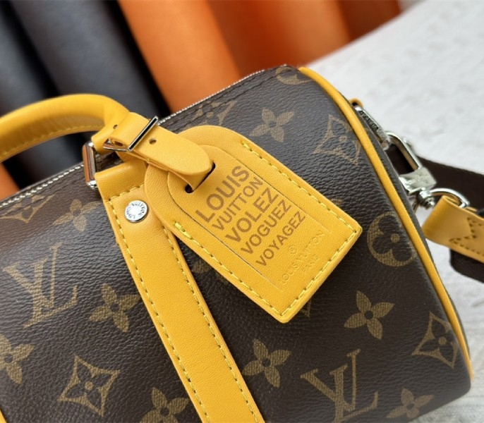 L0vis Vvtt0n Monogram Macassar Canvas Keepall Bandouliere 25 In Safran Yellow