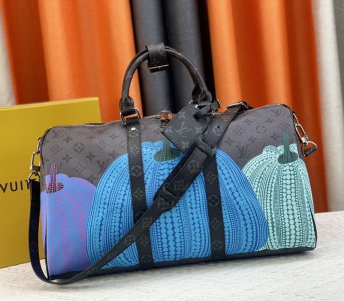 l0vis vvtt0n x yk monogram eclipse reverse keepall 45 lU*gage in pumpkin