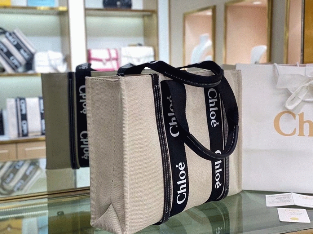 top quality knockoff Ch10e medium woody tote bag in canvas with black leather strips