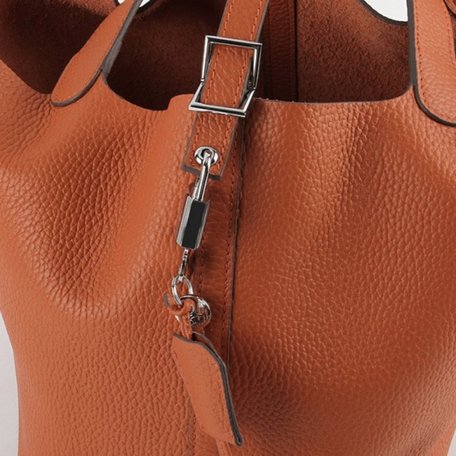 Orange knockoff H**me5 Picotin Lock handbag