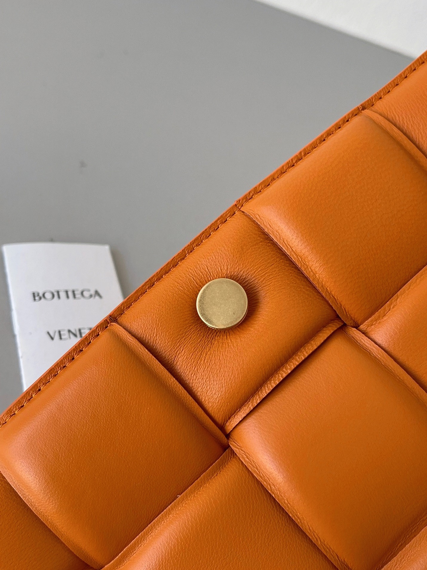 Top Quality Faux B0tt*ga Ven*ta Padded Cassette Bag In Orange