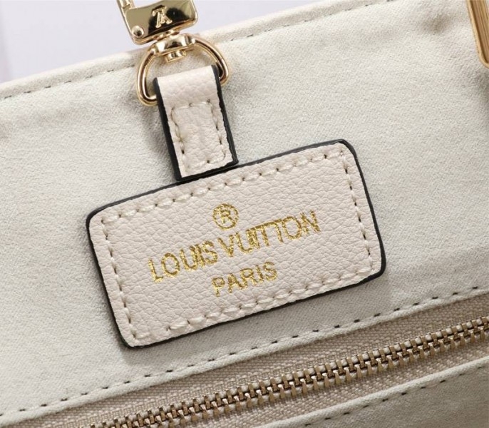 L0vis Vvtt0n Monogram Empreinte Leather Onthego MM Bag In Cream Saffron