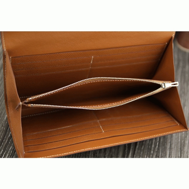 Brown replica H**me5 Constance wallet