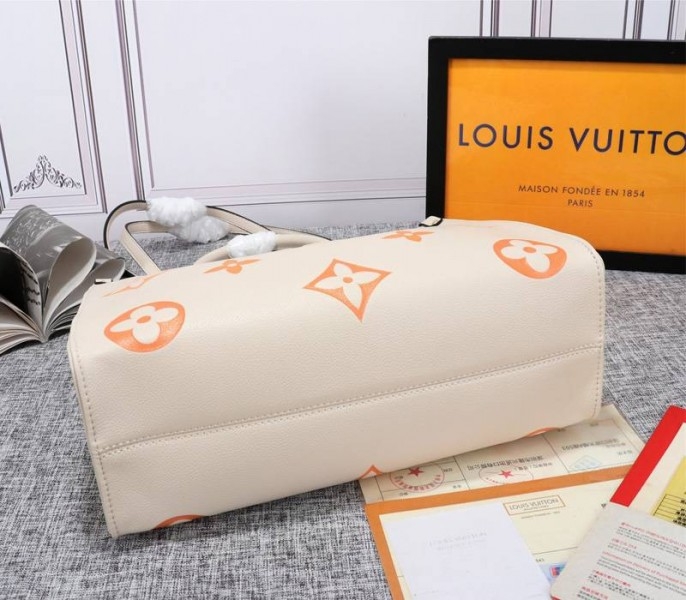 L0vis Vvtt0n Monogram Empreinte Leather Onthego MM Bag In Cream Saffron