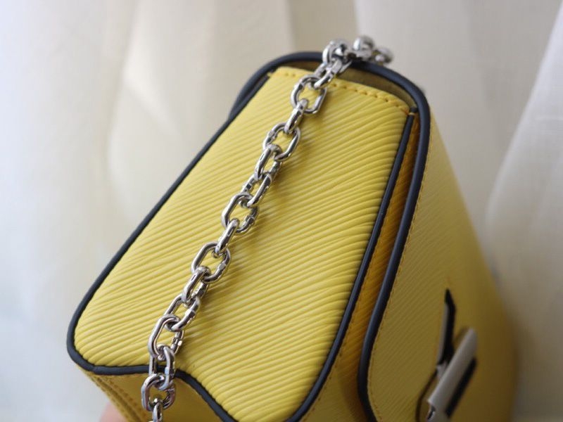 L0vis Vvtt0n Epi Leather Twist Mini Bag In Yellow