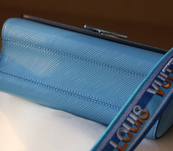 L0vis Vvtt0n Epi Leather Twist MM Bag With Jacquard Strap In Bleuet Blue