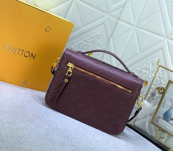 LV Monogram Empreinte Leather Metis In Wine
